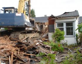 Excavator house demolition in Victoria BC