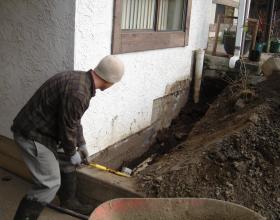 Excavation and repair of a newer drain tile system in Victoria BC