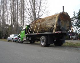 Trucking away commercial oil tank in Victoria BC