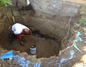 Hand excavating oil contaminated soil in Victoria BC