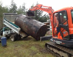 Large buried oil tank removed from residence in Victoria BC