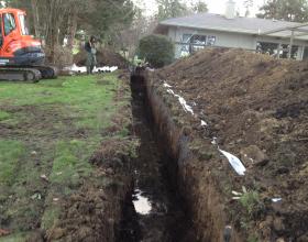 Curtain drain excavation and installation in Victoria BC