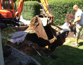 digging out buried oil tank from back yard in Nanaimo BC