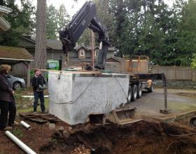 Installing concrete septic tank in Victoria BC