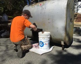 Cleaning out oil tank before disposal in Victoria BC