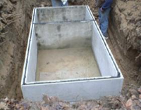 Installing septic tank lid in Duncan BC