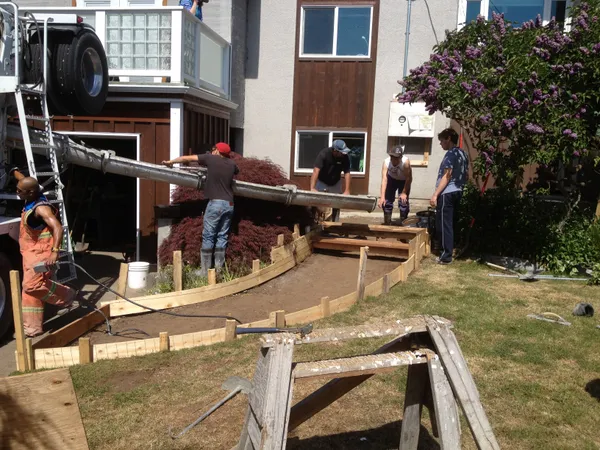 Fresh concrete pouring and finishing