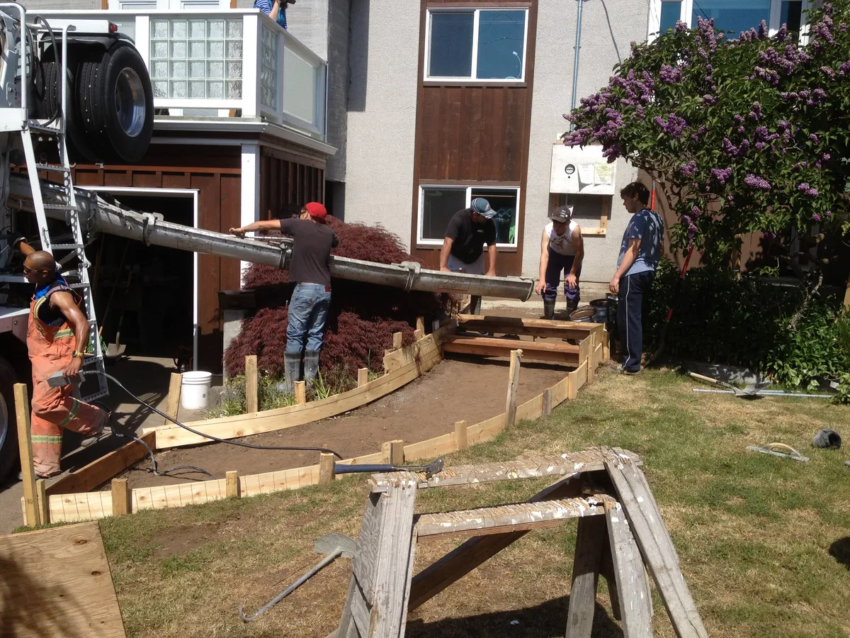 Fresh concrete pouring and finishing