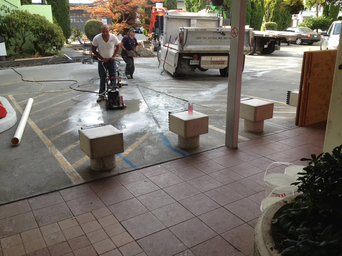 Concrete slab cutting and removal process