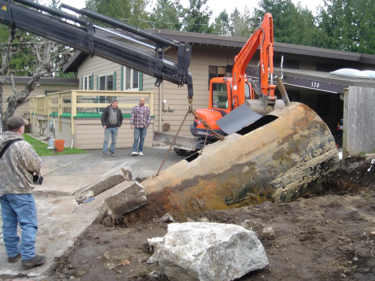Oil tank removal under concrete driveway