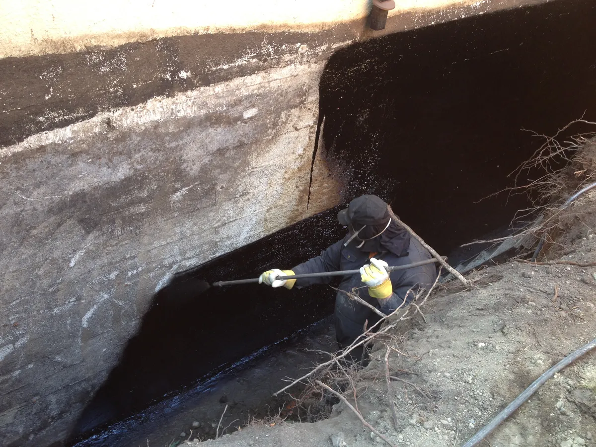 Foundation damp-proofing application