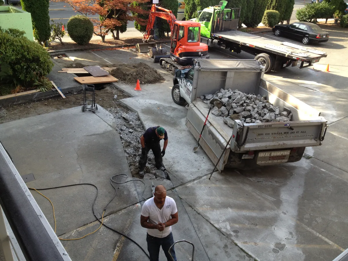 Jackhammer removal of concrete slab
