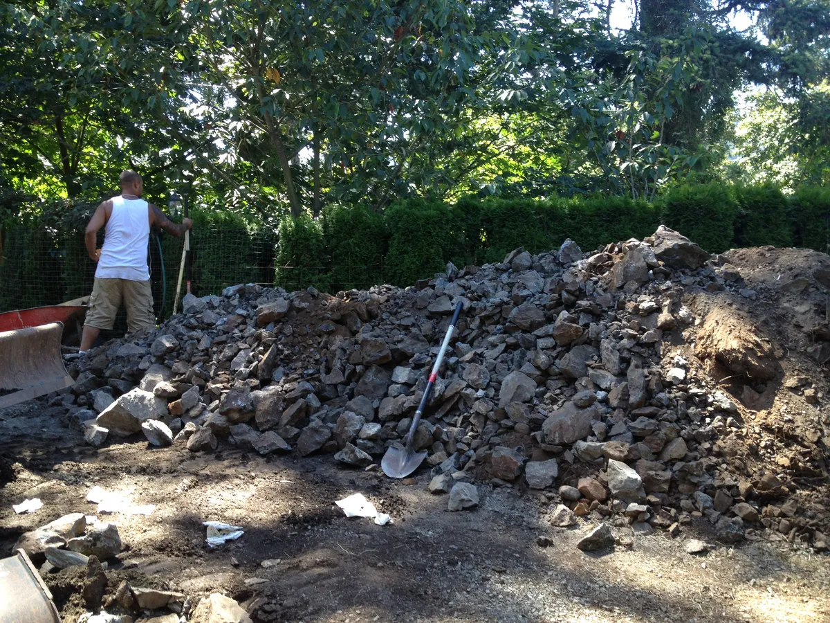 Breaking and removing large rocks