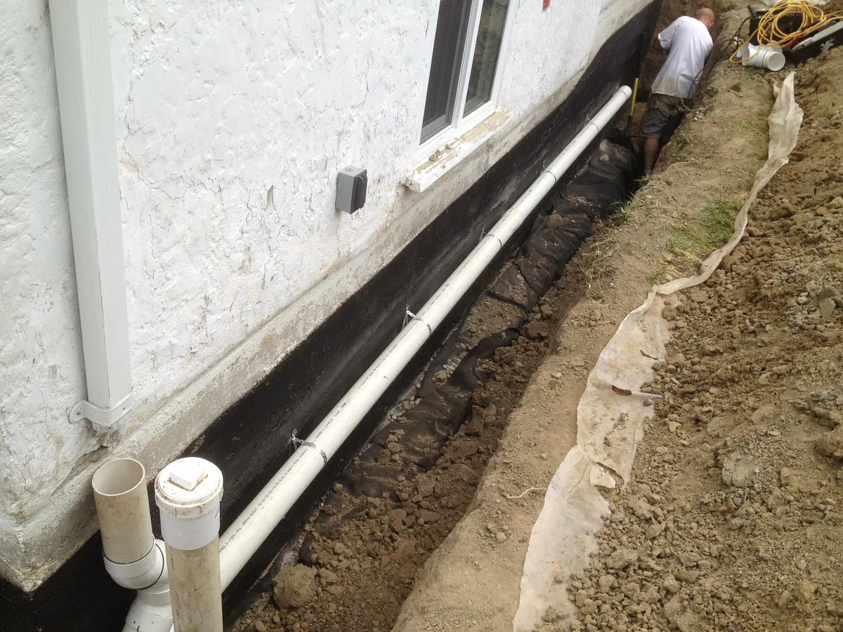 Installing new drain tile system