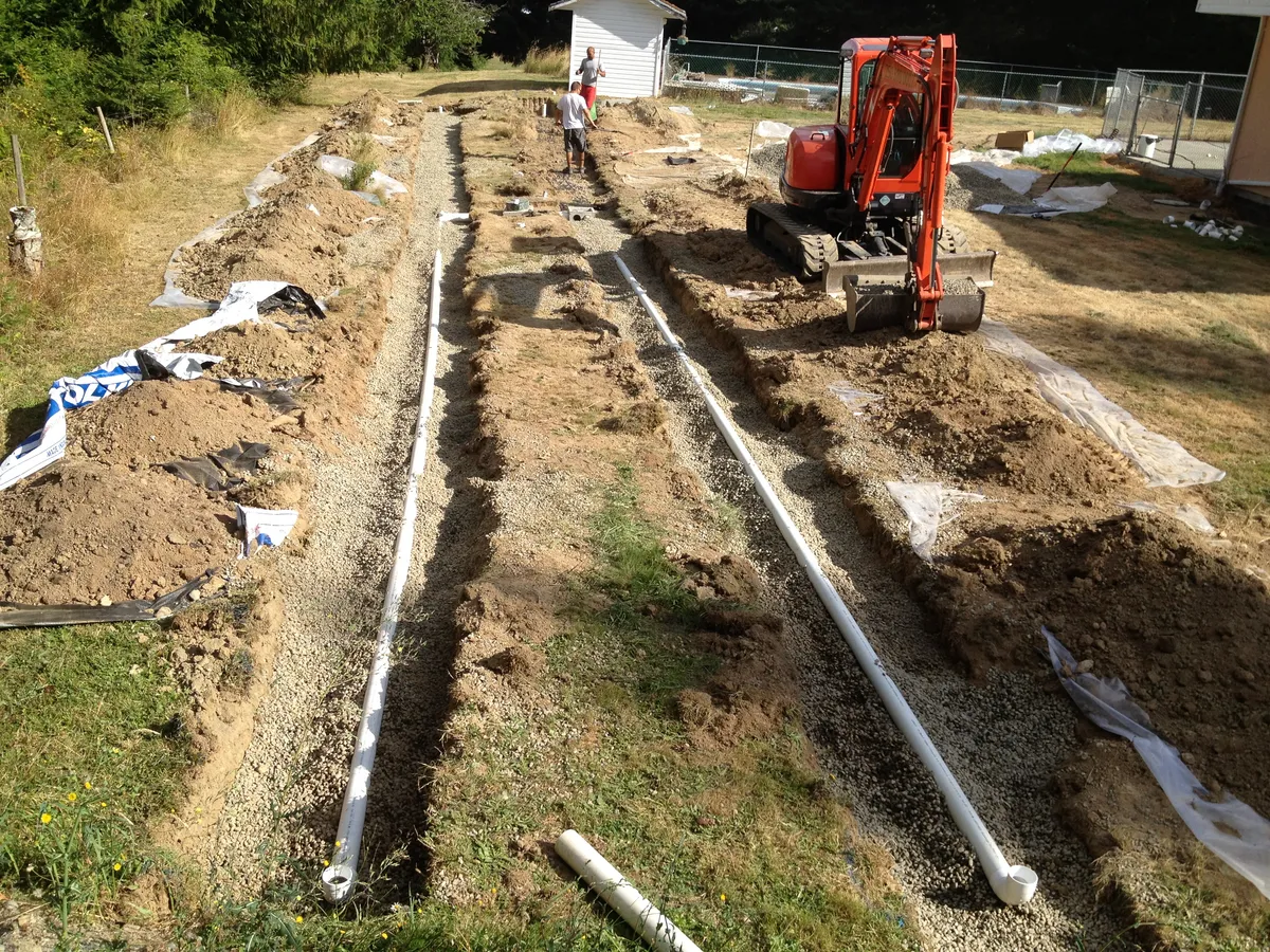 Fresh septic field construction with drain pipes