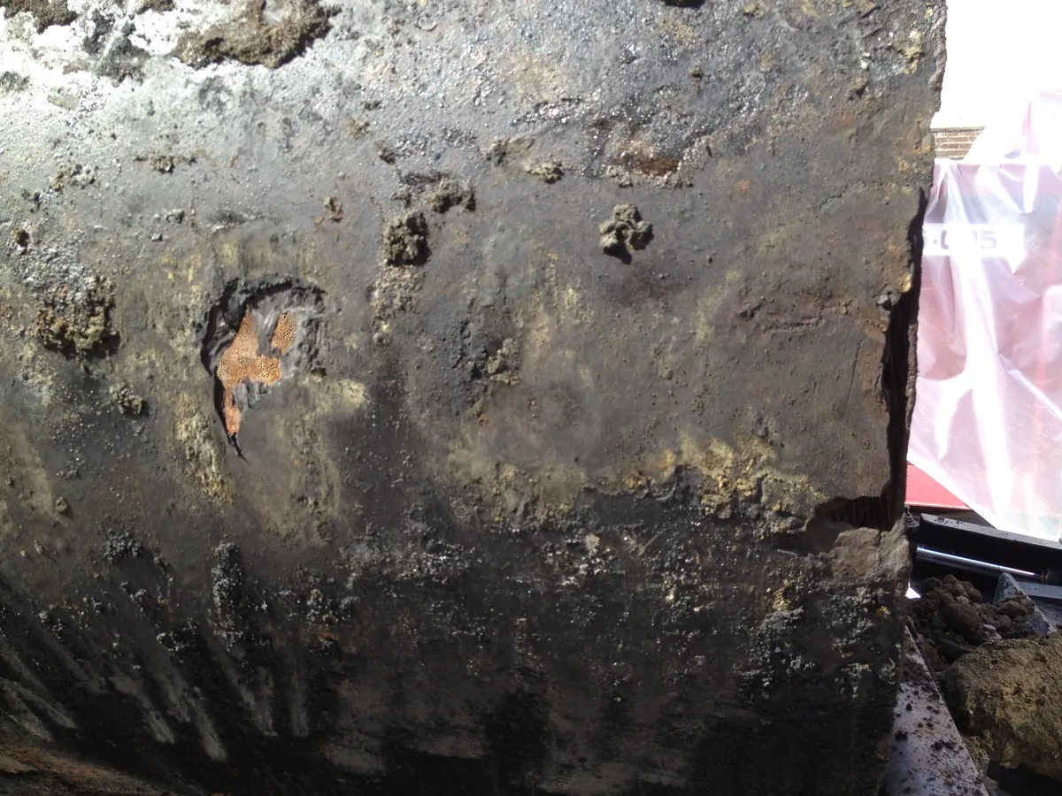 Rust holes causing oil tank leakage