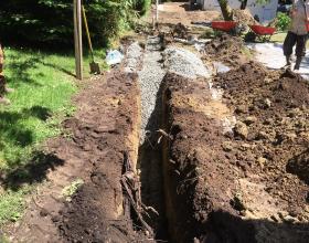 drain rock installed over perforated pipe in Duncan BC