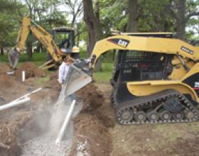 Installing drain rock in septic field in Victoria BC